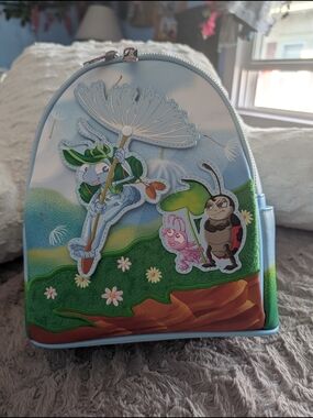 Loungefly Light Blue Kids Mini Backpack with Playful Nature Characters